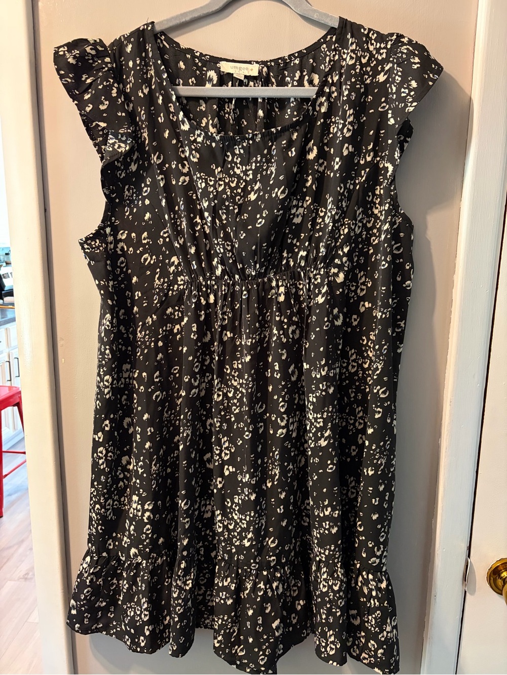 Women's Black and White Printed Ruffle Sleeve dress.